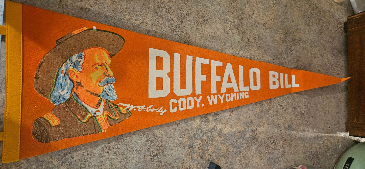 Vintage Buffalo Bill Cody Wyoming souvenir felt pennant showing orange felt white lettering portrait graphic and script signature