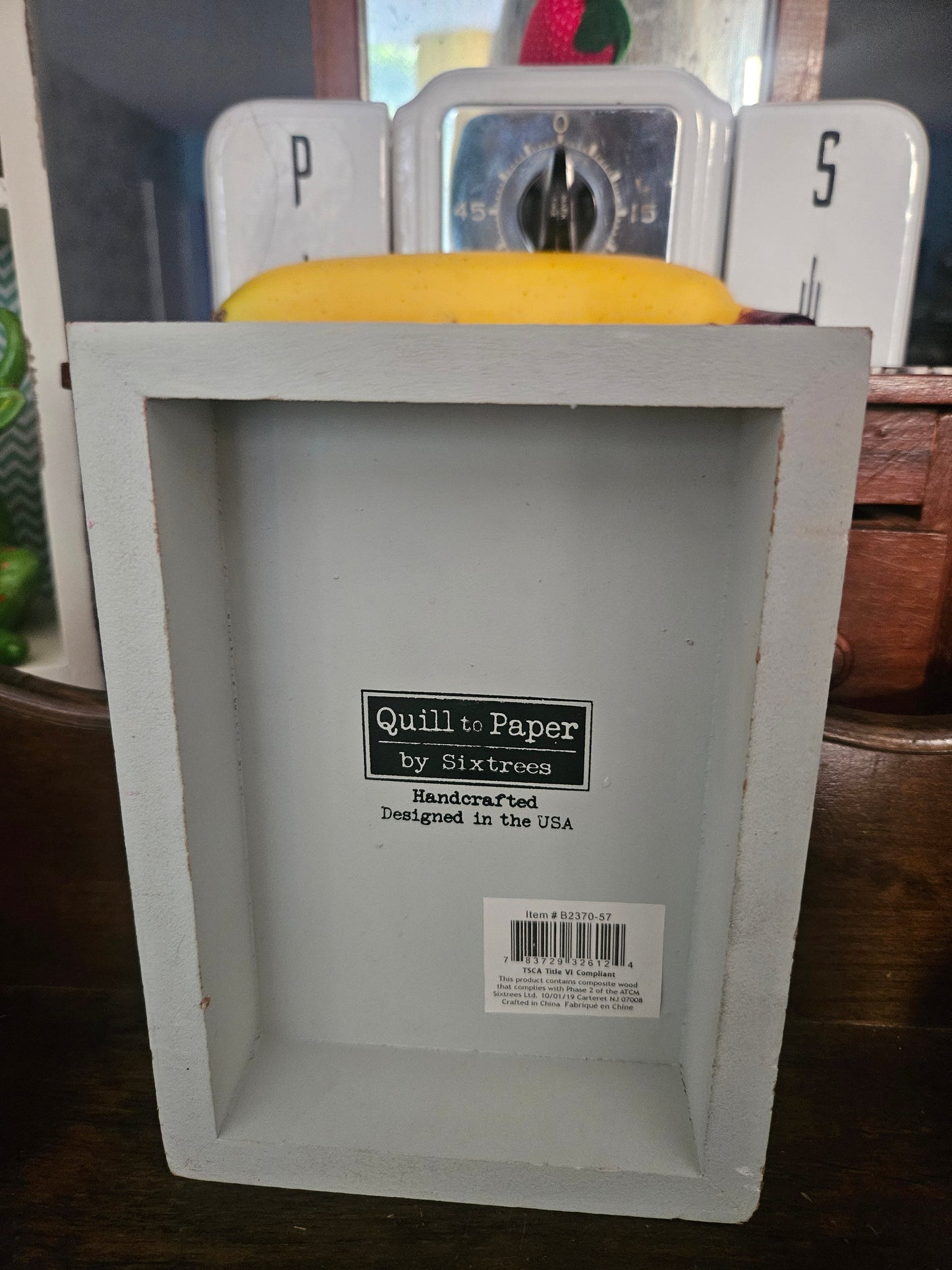 Back of Fries Before Guys wood sign showing hollow frame construction and Quill to Paper by Sixtrees brand label
