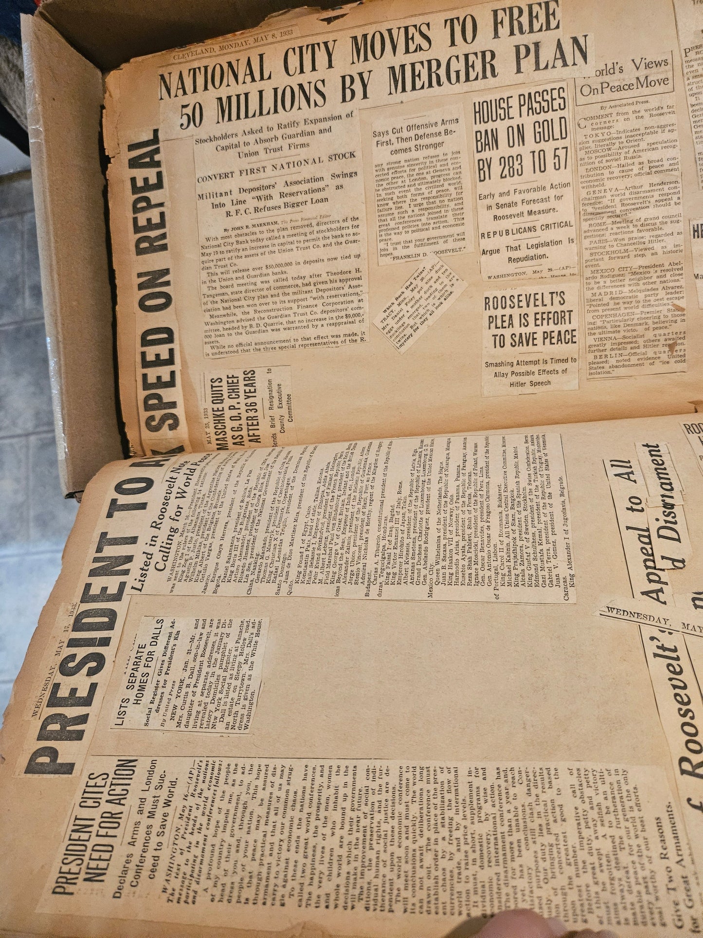 Interior pages showing National City Moves to Free 50 Millions and Roosevelt headlines from 1933