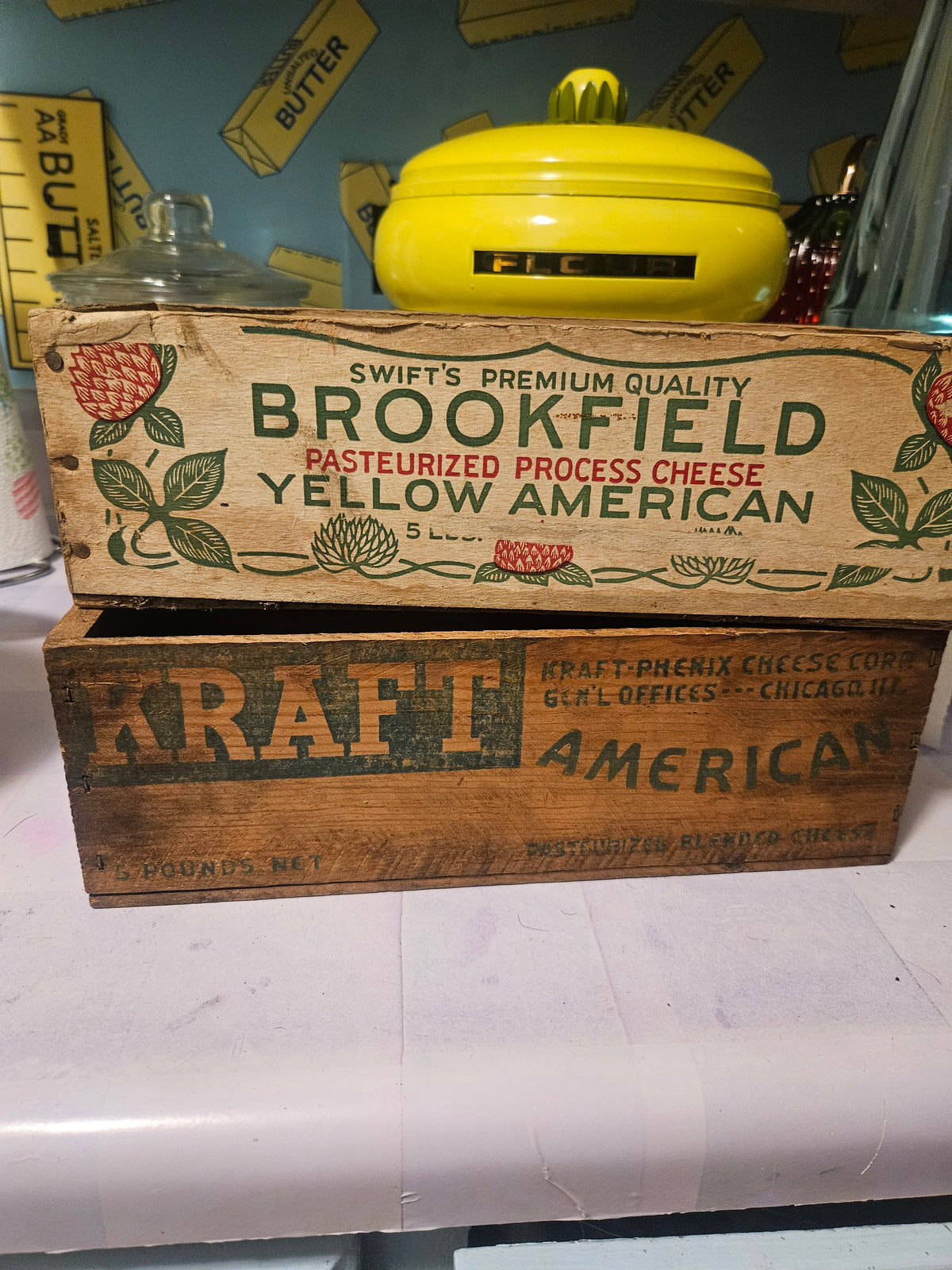 Vintage Brookfield and Kraft wooden cheese crate set stacked, angled view showing both boxes