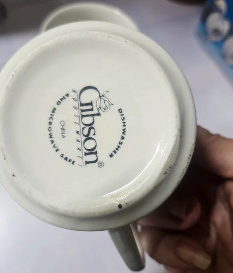 Gibson maker's mark on bottom of mug showing dishwasher and microwave safe