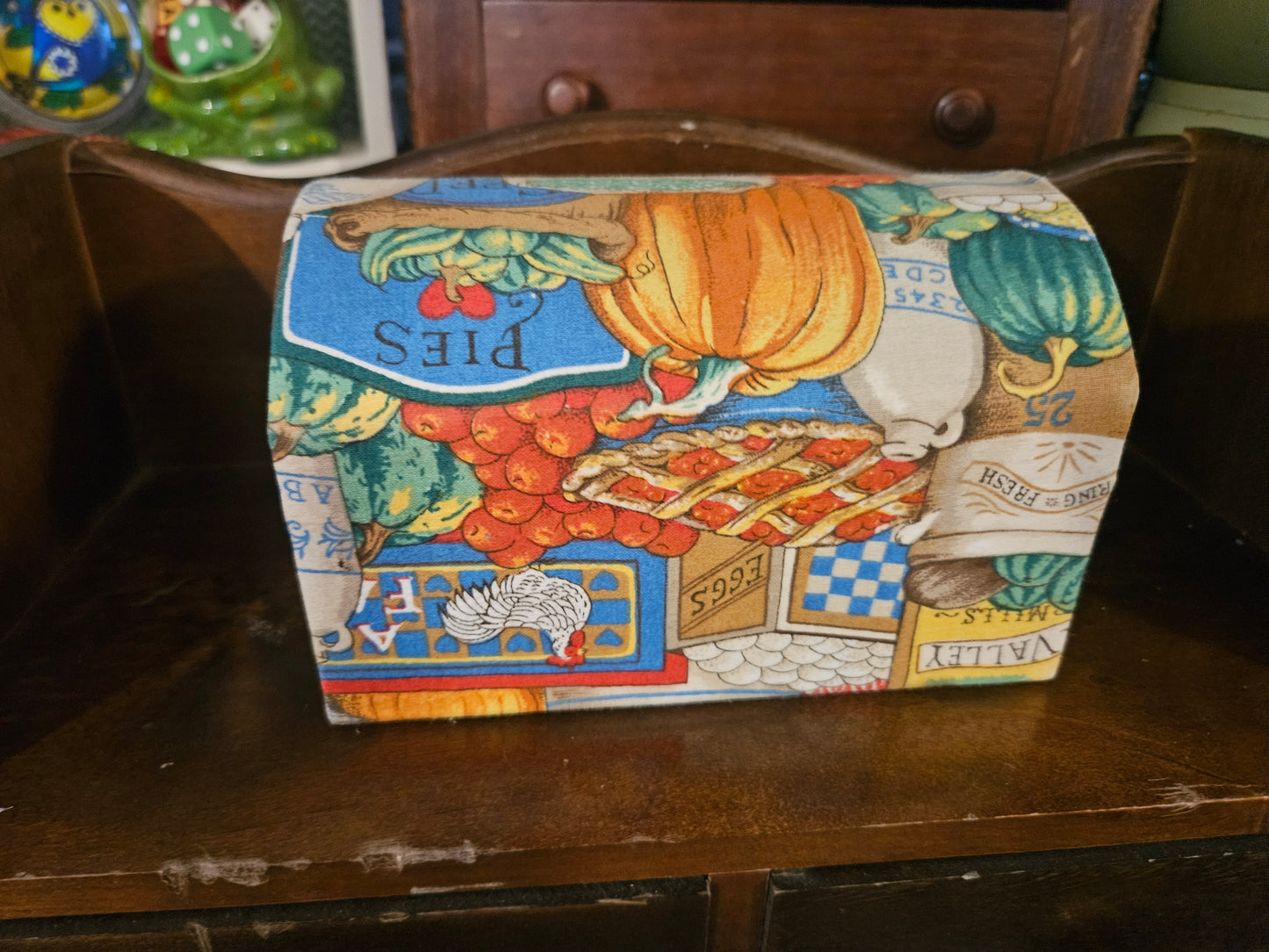 Back of recipe box showing pies, pumpkin, eggs, and rooster