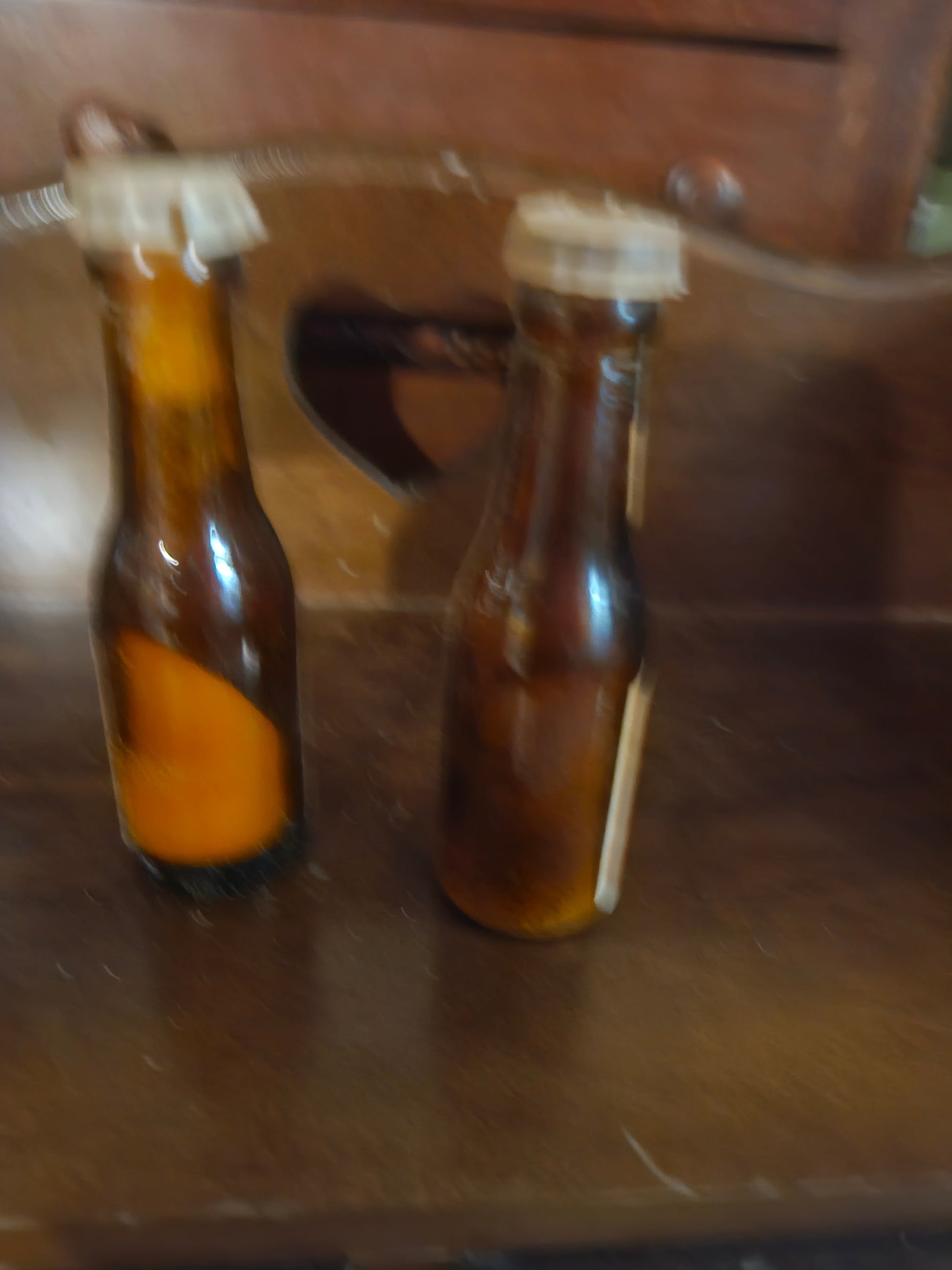 Budweiser miniature bottle shakers side view showing amber glass and label detail