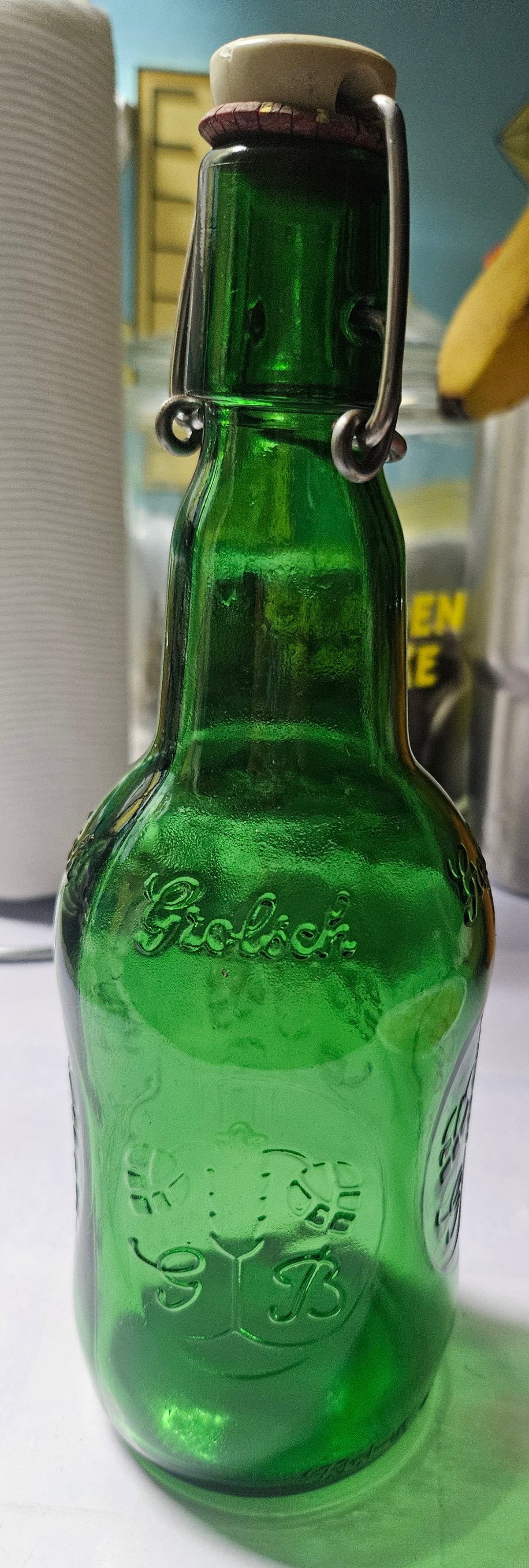 Close-up of Grolsch porcelain swing-top cap and metal closure