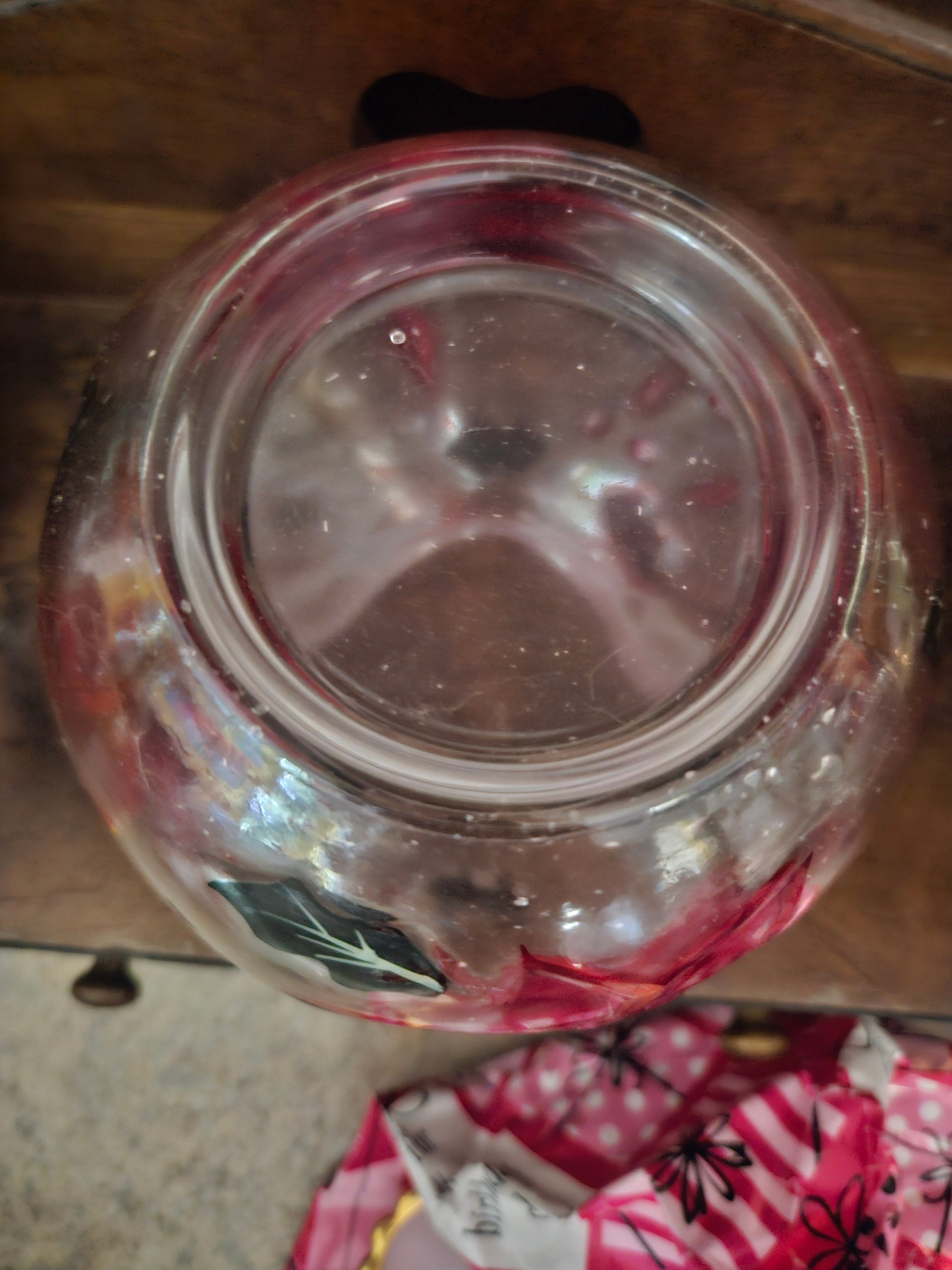 Interior of globe base showing open top where candle is placed