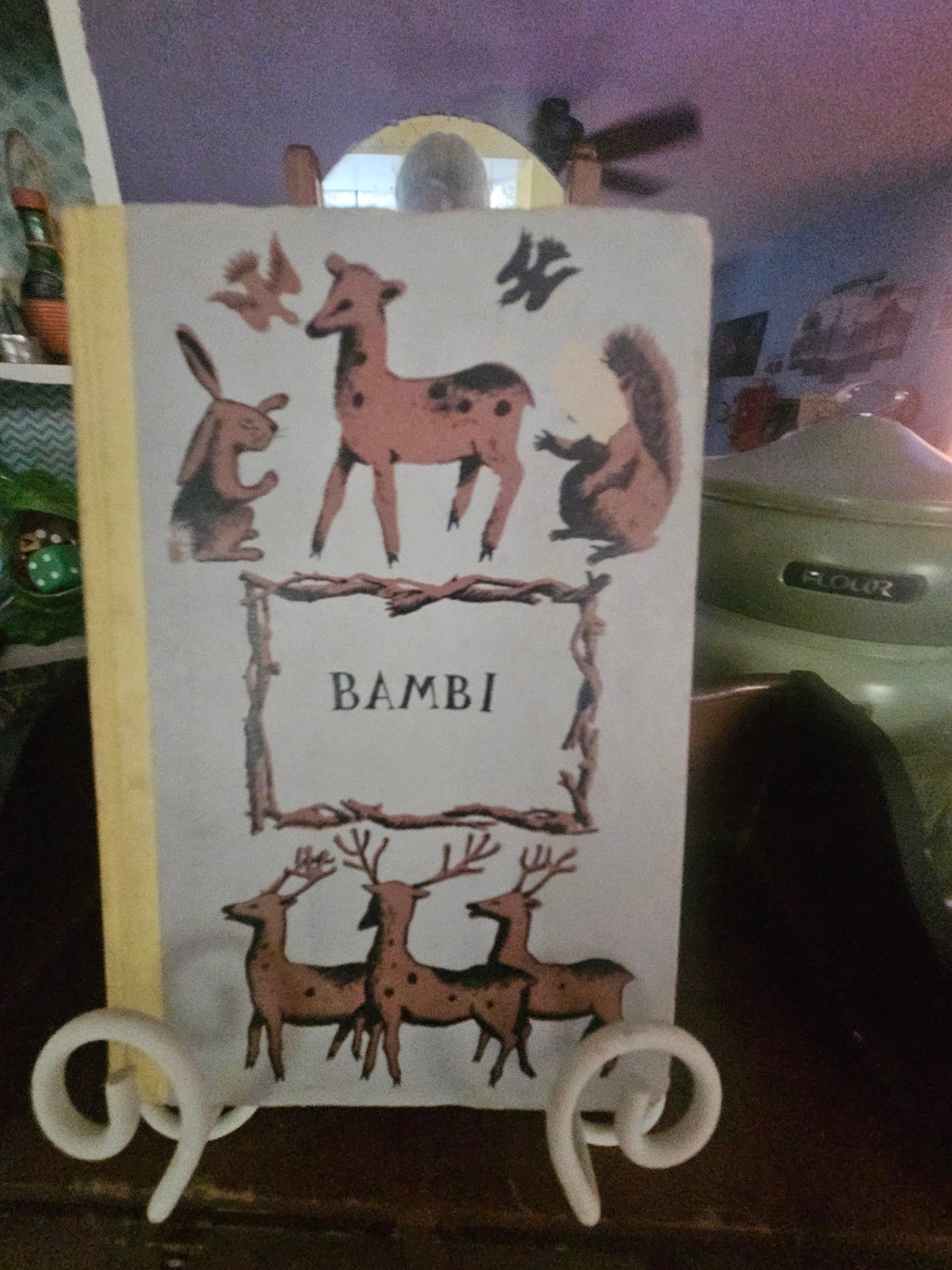 Vintage Bambi hardcover book front cover showing deer rabbit and squirrel folk art illustration