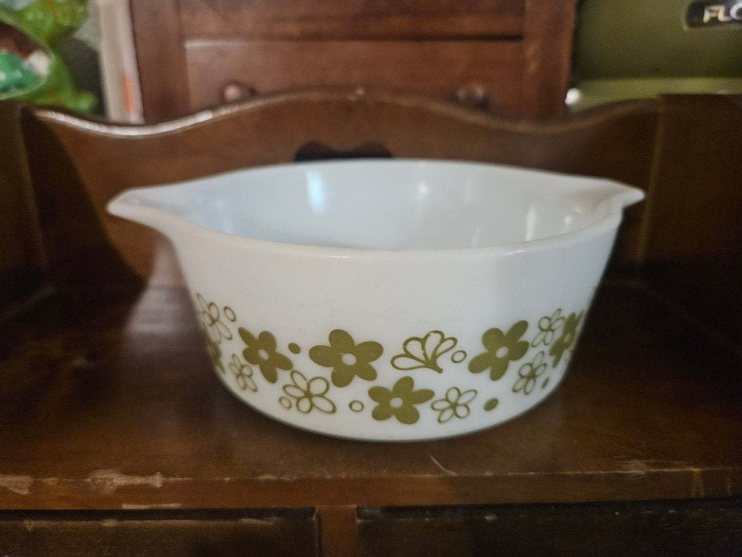 Pyrex Spring Blossom 472 casserole dish front view showing tab handles and full pattern