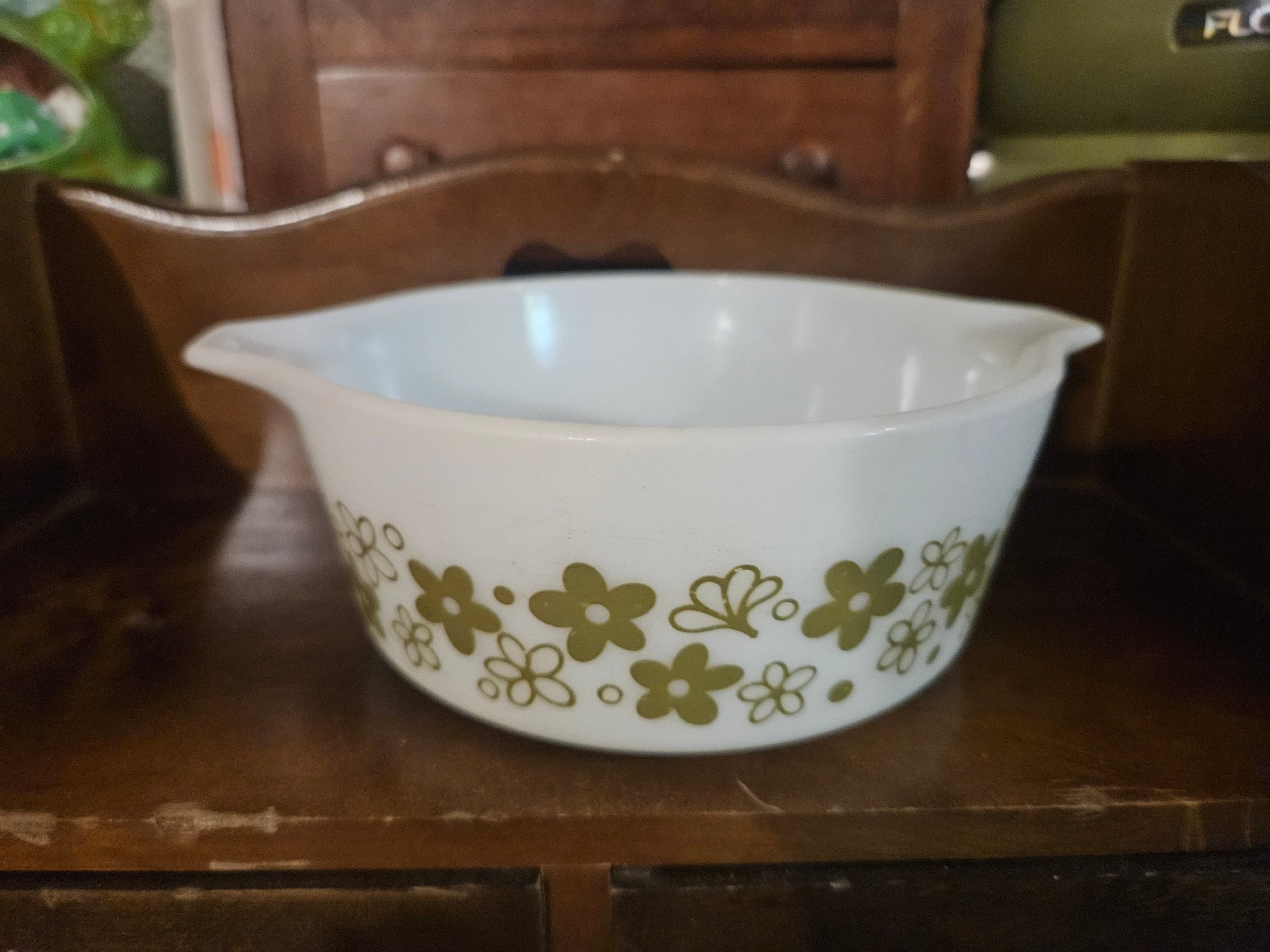 Pyrex Spring Blossom 472 casserole dish front view showing tab handles and full pattern