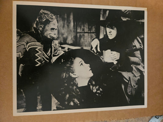 Vintage black and white photo print of Dorothy and Scarecrow inside the Wicked Witch castle with Winged Monkey guards in background