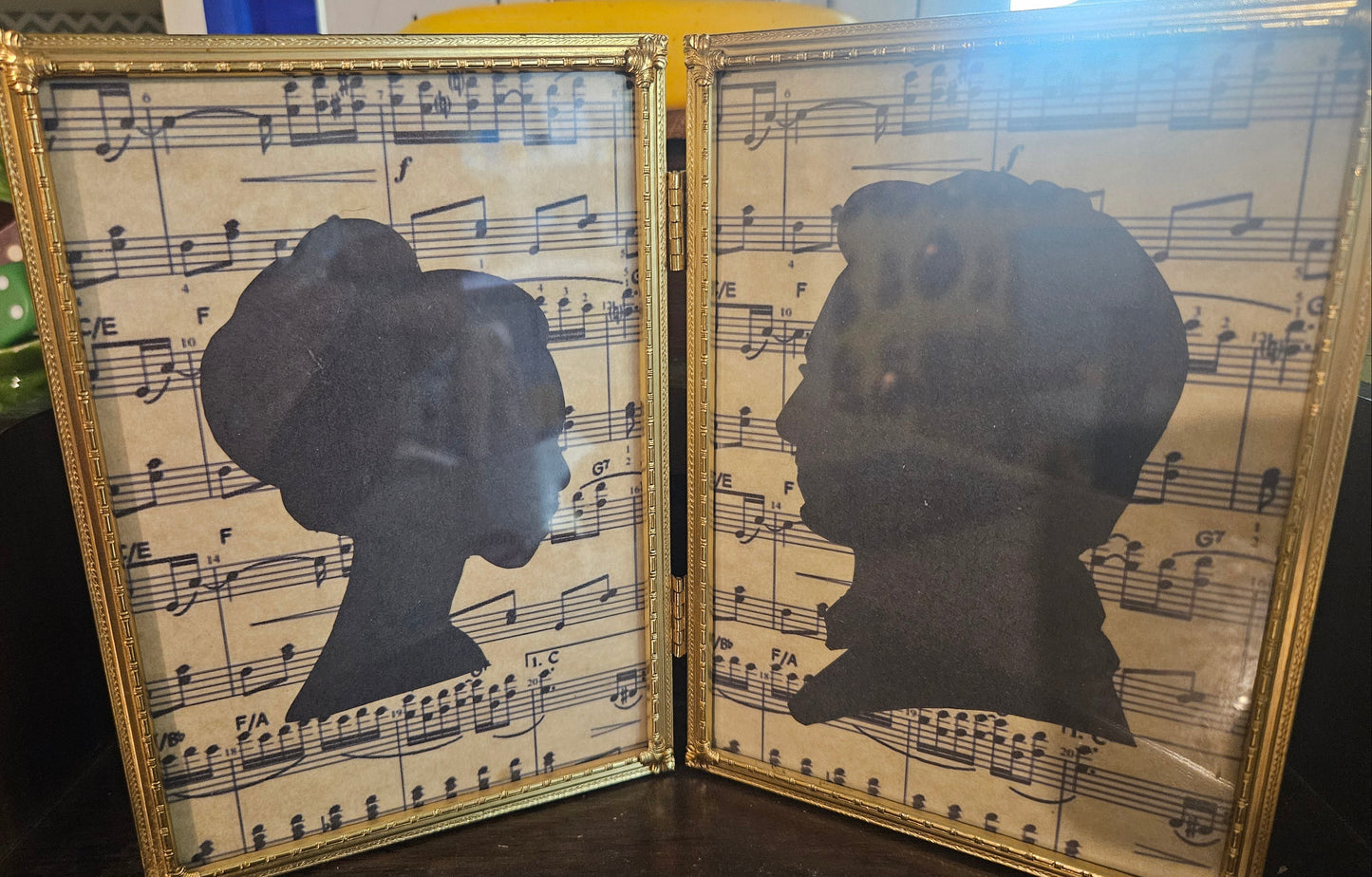Vintage Silhouette Portrait Pair on Sheet Music — Hinged Double Gold Metal Frame