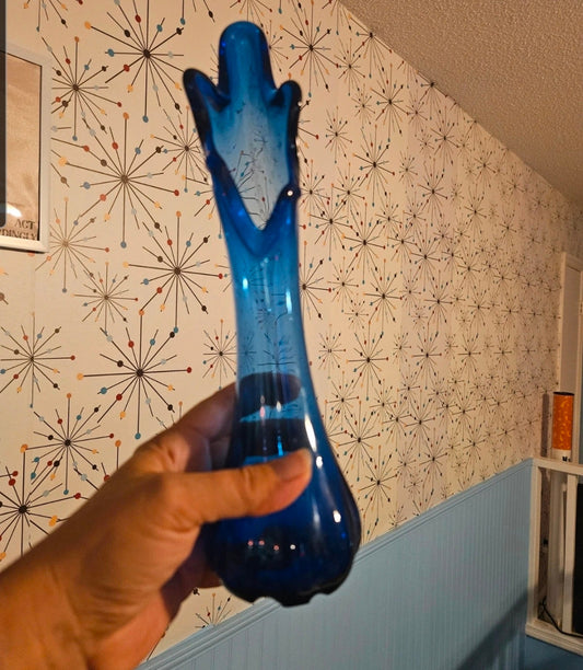 Cobalt blue art glass swung bud vase with ruffled pulled top and bulbous scalloped base