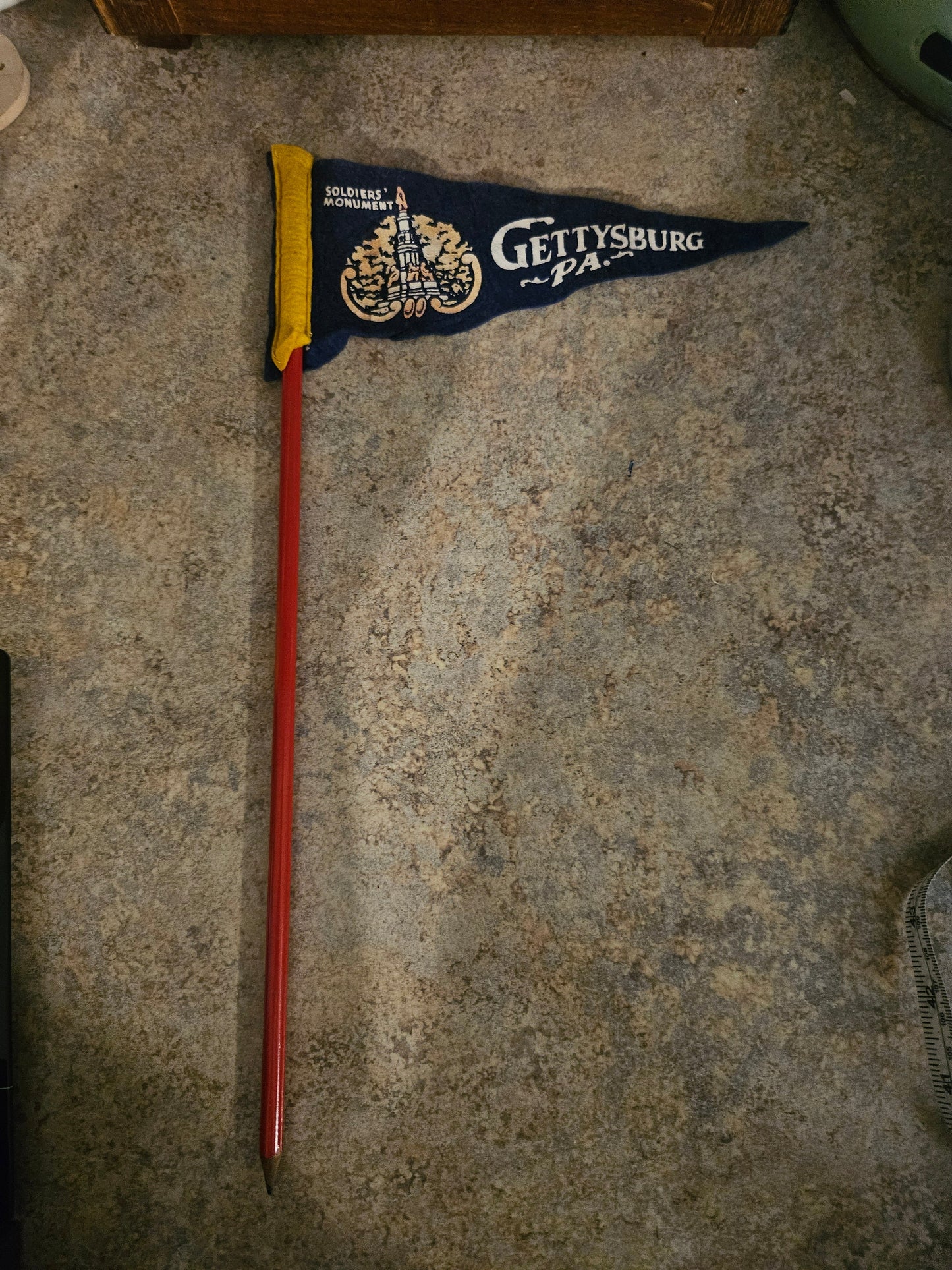 Vintage Gettysburg PA souvenir felt pennant with Soldiers Monument graphic on original red wooden stick