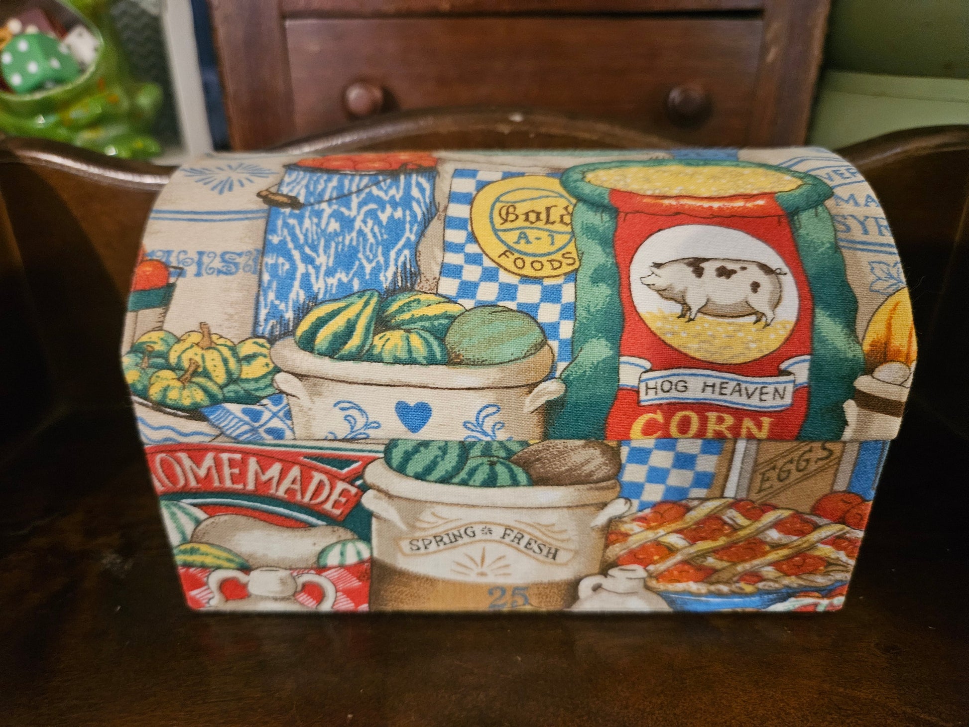 Fabric covered recipe box front showing Hog Heaven Corn, Bold A-1 Foods, and stoneware crock