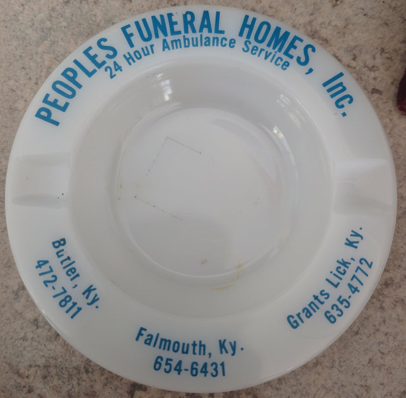 Vintage Peoples Funeral Homes Inc milk glass advertising ashtray showing teal lettering with Kentucky locations