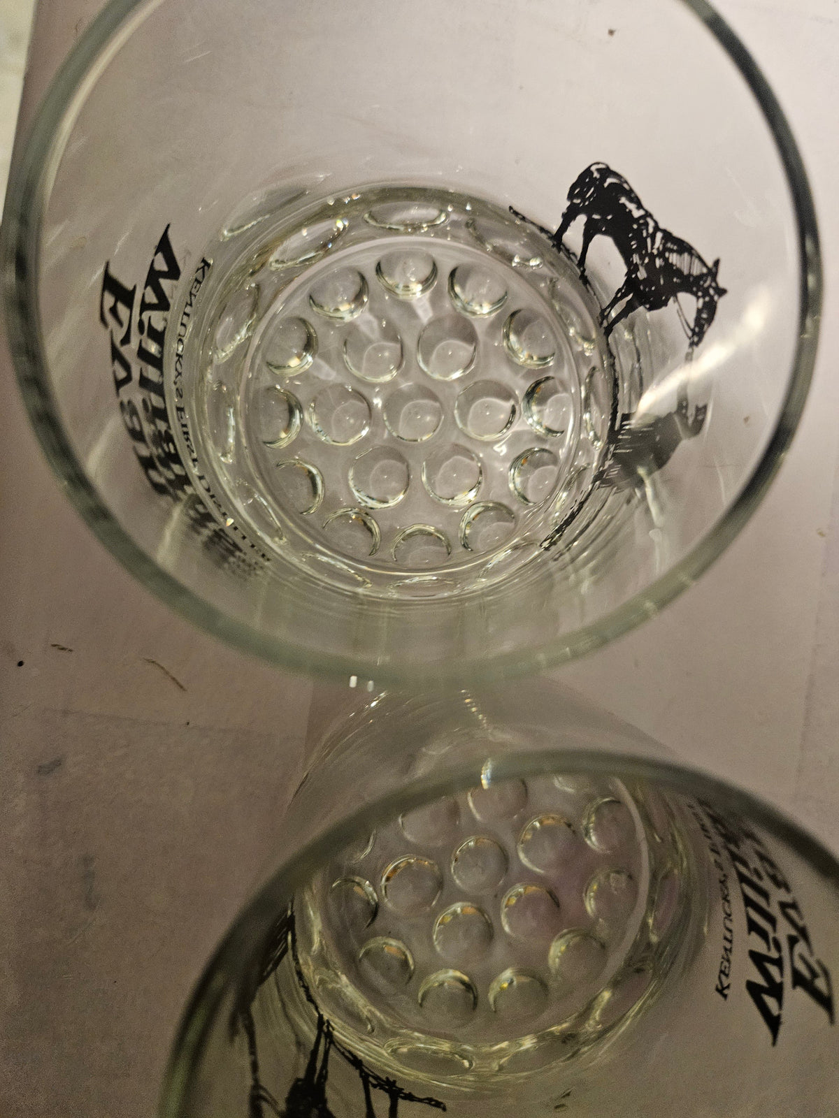 Top-down view of the two rocks glasses showing raised-dot bases