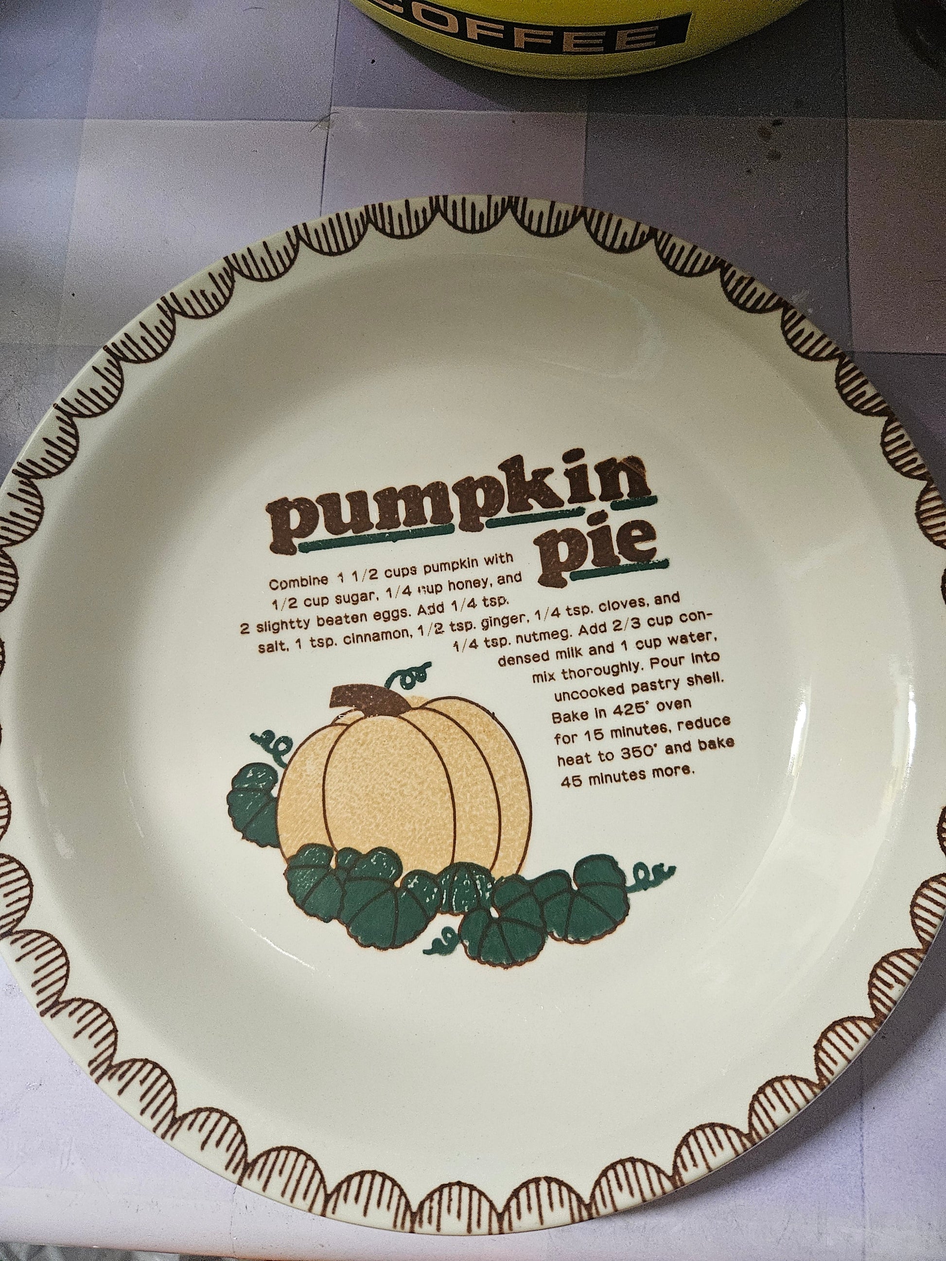 Mount Clemens Pottery pumpkin pie recipe pie dish interior showing recipe text and pumpkin illustration