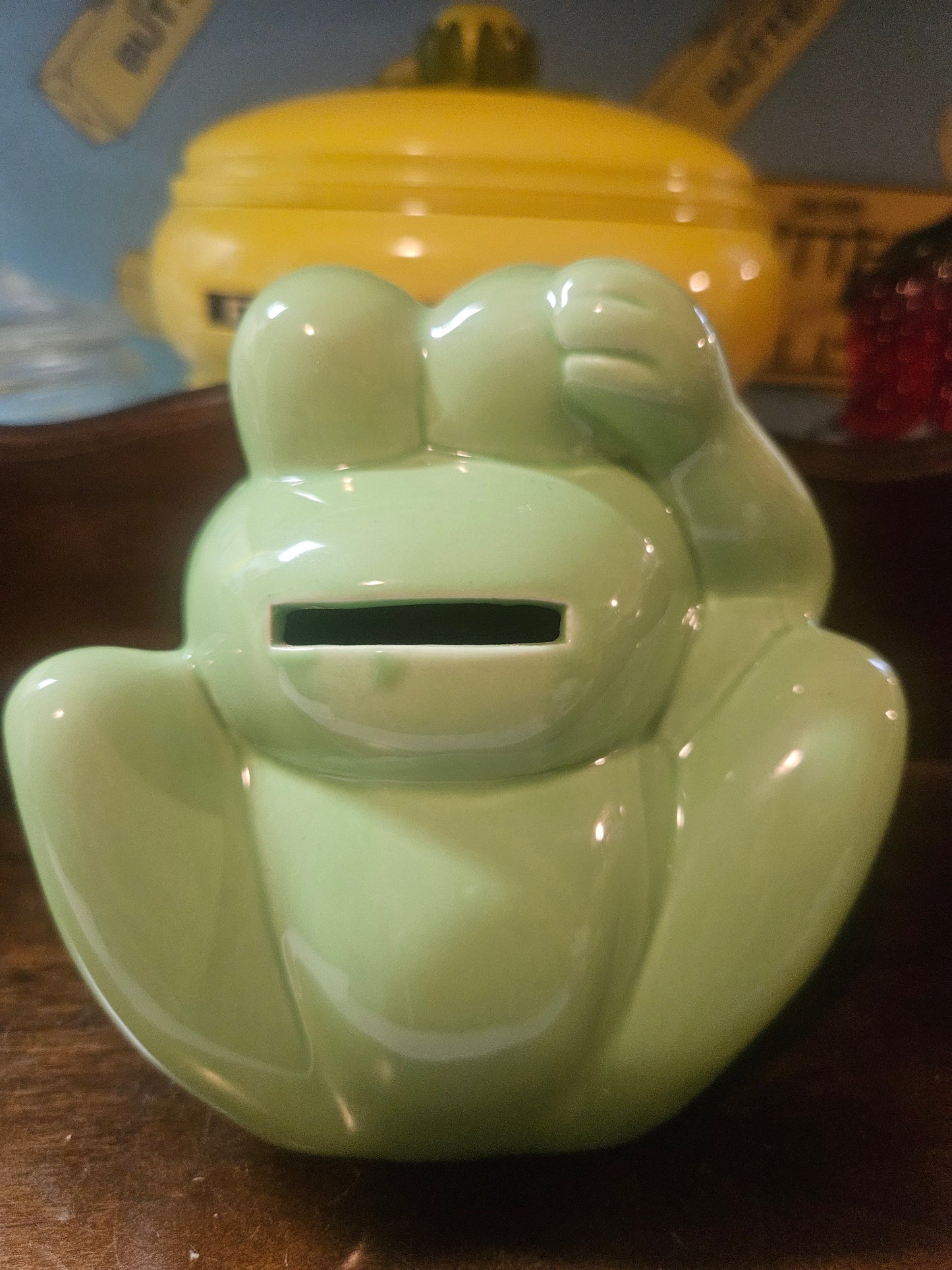 Back view showing coin slot on belly