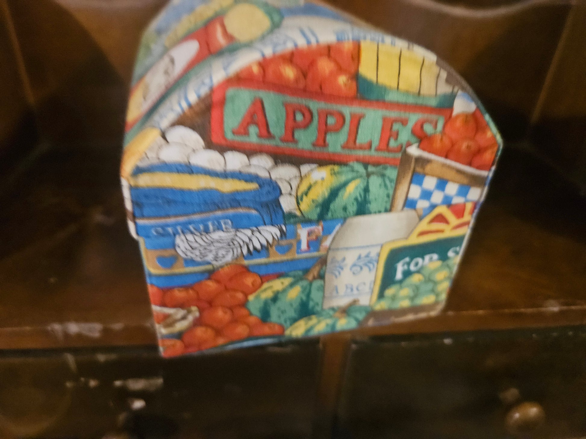 Other side of recipe box showing Apples sign and farm produce
