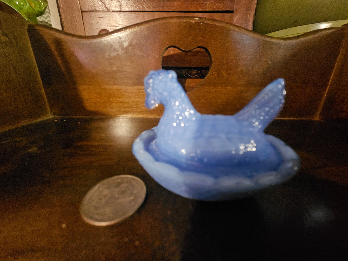 Modern blue slag glass hen on a nest covered dish with quarter for size reference