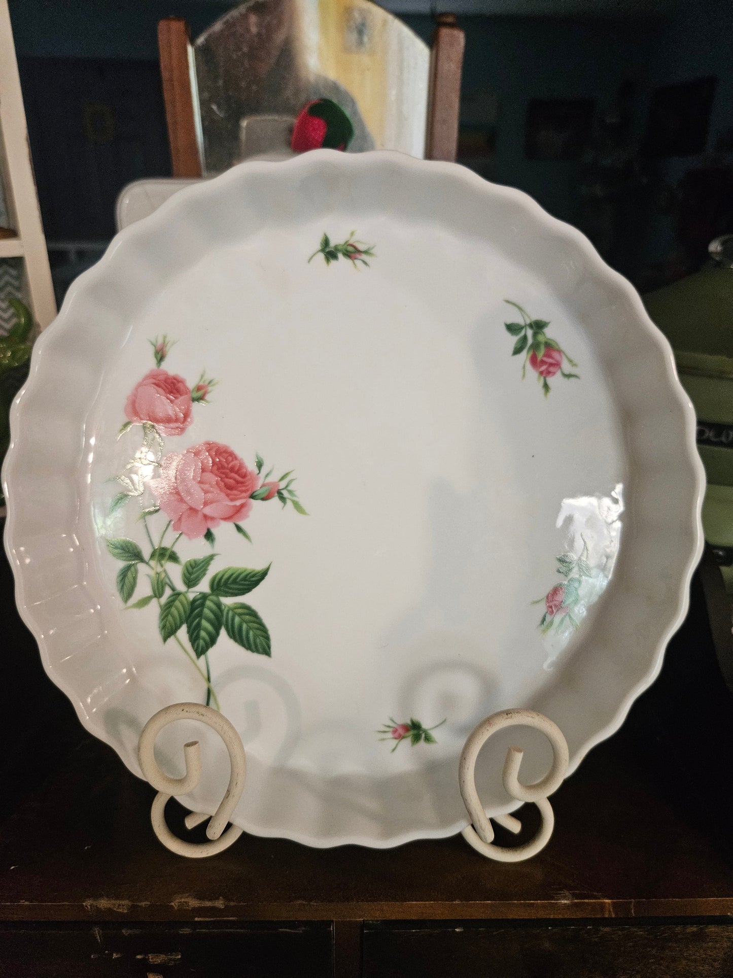 Christineholm pink roses scalloped ceramic plate 9 inch, front view on plate stand