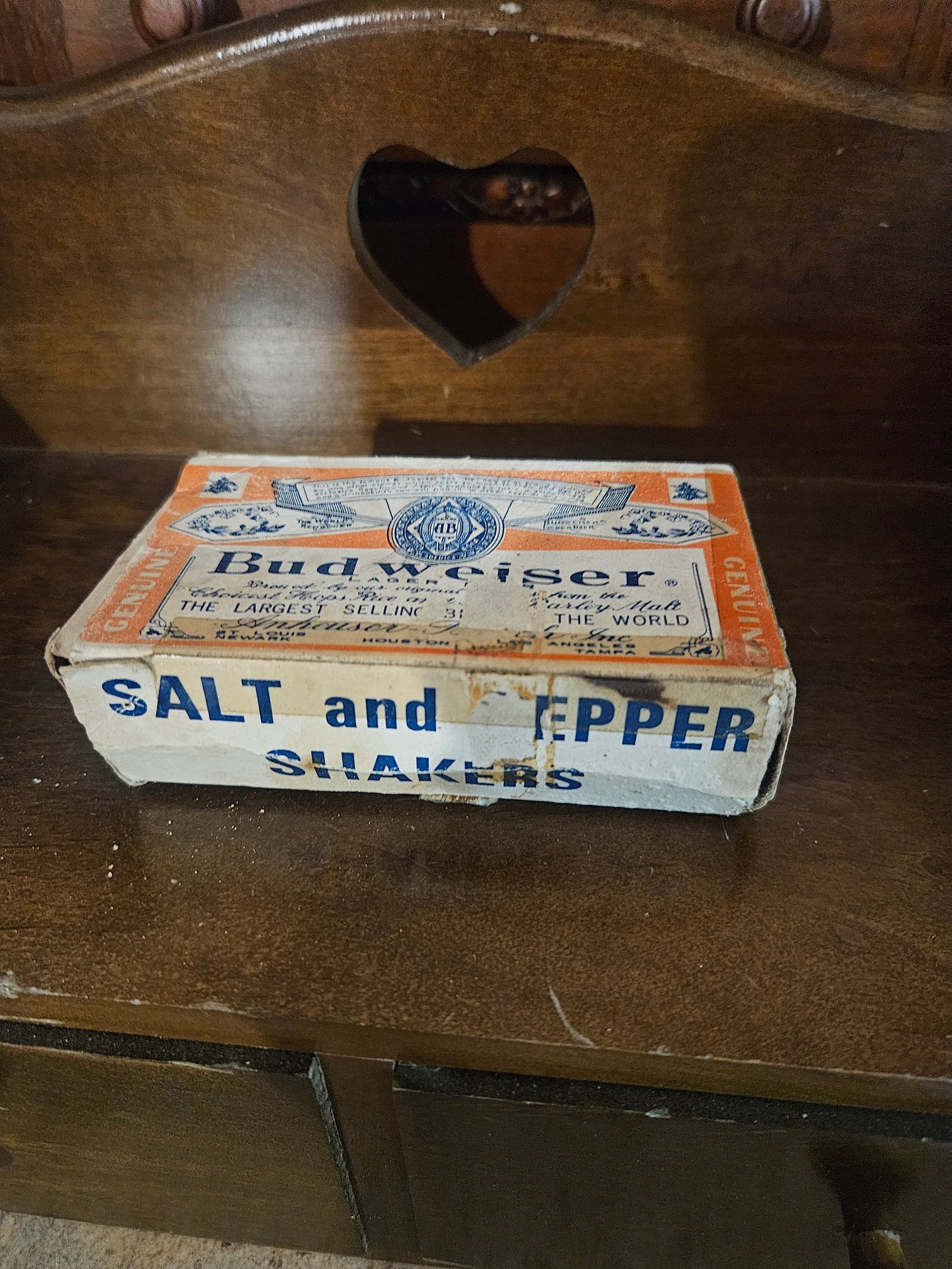 Original Budweiser salt and pepper shaker box front showing Genuine Budweiser label and Largest Selling Beer in the World text